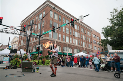 Hilby the Skinny German Juggling Boy performs for an audience of well over 100 at the West end of the Ithaca Commons